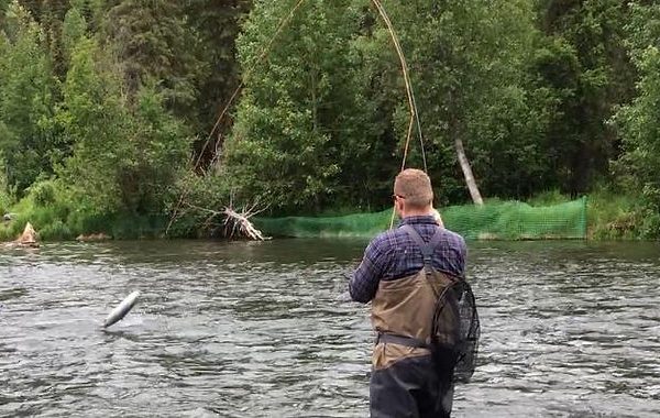 Dr. Thayne Dawson fly fishing in his free time